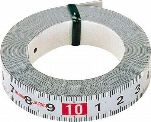 Klijuojama plieninė liniuotė Tajima 5m x 13mm