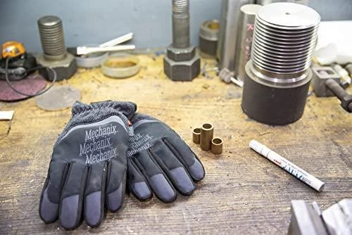 Mechanix ColdWork FastFit pirštinės ant darbo stalo