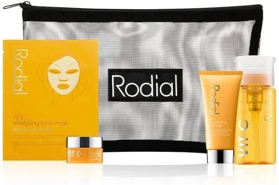 „Little Luxuries“ rinkinys „Rodial“: skaistinamasis veido gelis su vitaminu C, 20 ml + skaistinamoji pudra su vitaminu C, 15 ml + skaistinamasis tonikas su vitaminu C, 100 ml + energizuojanti veido kaukė su vitaminu C, 20 g