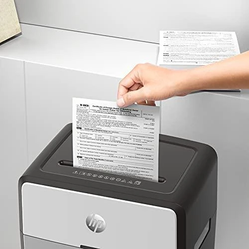 HP Oneshred 24CC smulkintuvas naudojimo metu
