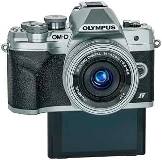 Olympus Apie sistemą Olympus OM-D E-M10 Mark IV (Sidabrinis) + 14-42mm f/3.5-5.6 EZ
