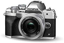 Olympus Apie sistemą Olympus OM-D E-M10 Mark IV (Sidabrinis) + 14-42mm f/3.5-5.6 EZ