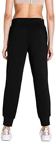 Kelnės Puma ESS Sweatpants TR W 586842 01 (Feature-M)