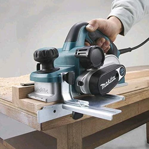 Makita KP0810CJ Elektrinis oblius 82 mm, 0-4 mm, 1050 W, 3,4kg, MAKPACK