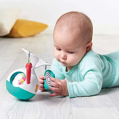 Tiny Love karuselė - interaktyvus žaislas pievoje