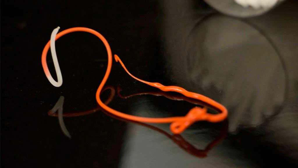Dyna-Purge valymo plastikas - oranžinis siūlas