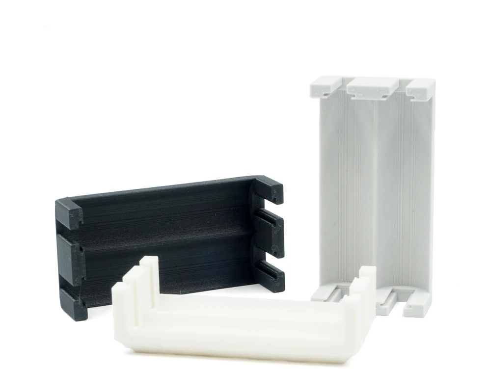 3D spausdinti plastikiniai U formos laikikliai