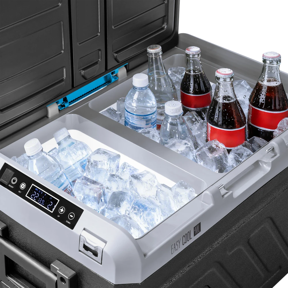 Profesionalus TEESA kompresorinis kelioninis šaldytuvas su šaldymo funkcija, 40 l DC12/24 AC 230 V, maitinimas baterijomis, dideli ratukai ir tvirta rankena, Bluetooth, du skyriai