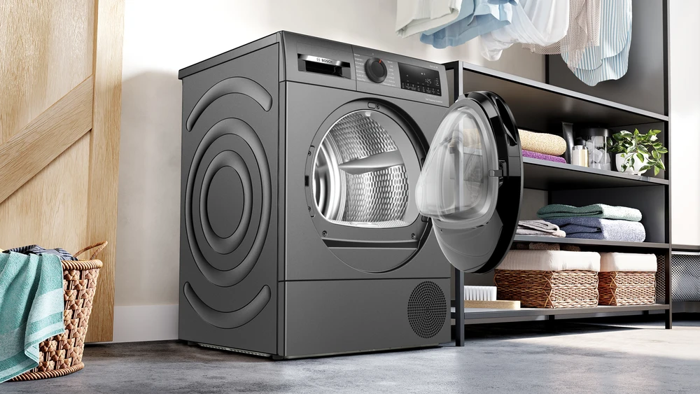 „Bosch“ džiovyklė su šilumos siurbliu | WQG245DXSN | Energijos vartojimo efektyvumo klasė C | Priekinis pakraunamas | 9kg | Kondensacija | LCD | Gylis 61,3 cm | Pilkas