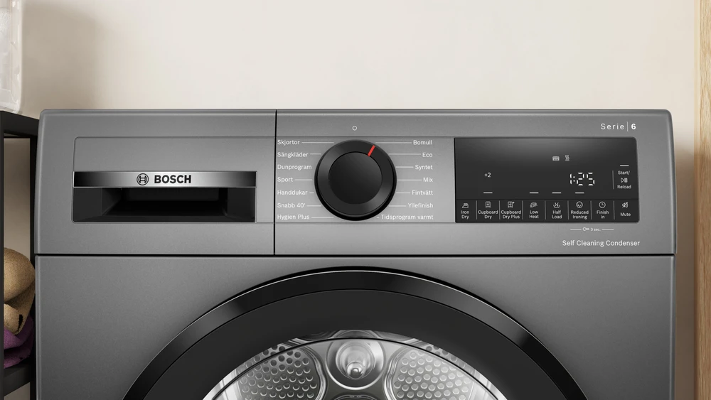 „Bosch“ džiovyklė su šilumos siurbliu | WQG245DXSN | Energijos vartojimo efektyvumo klasė C | Priekinis pakraunamas | 9kg | Kondensacija | LCD | Gylis 61,3 cm | Pilkas