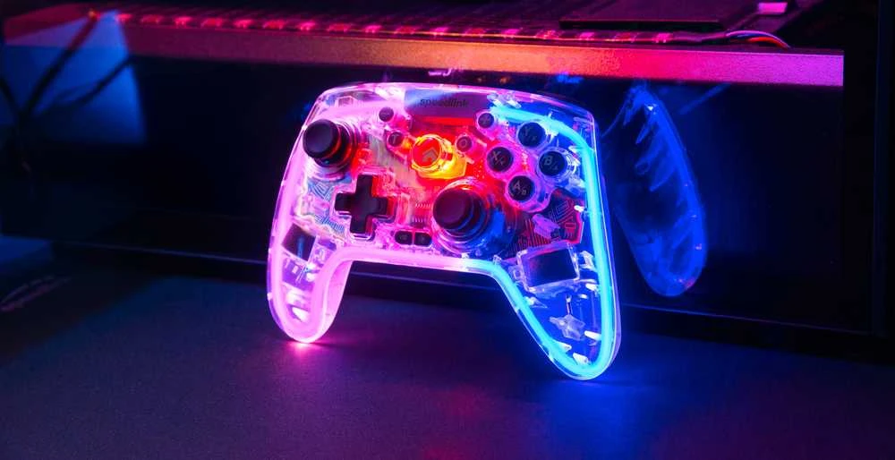 „Speedlink RAIT NX RGB“ belaidis/laidinis žaidimų pultas, skirtas asmeniniams kompiuteriams, „Android“ ir „Switch OLED“ bei „Lite“ įrenginiams, skaidrus ir skaidrus.