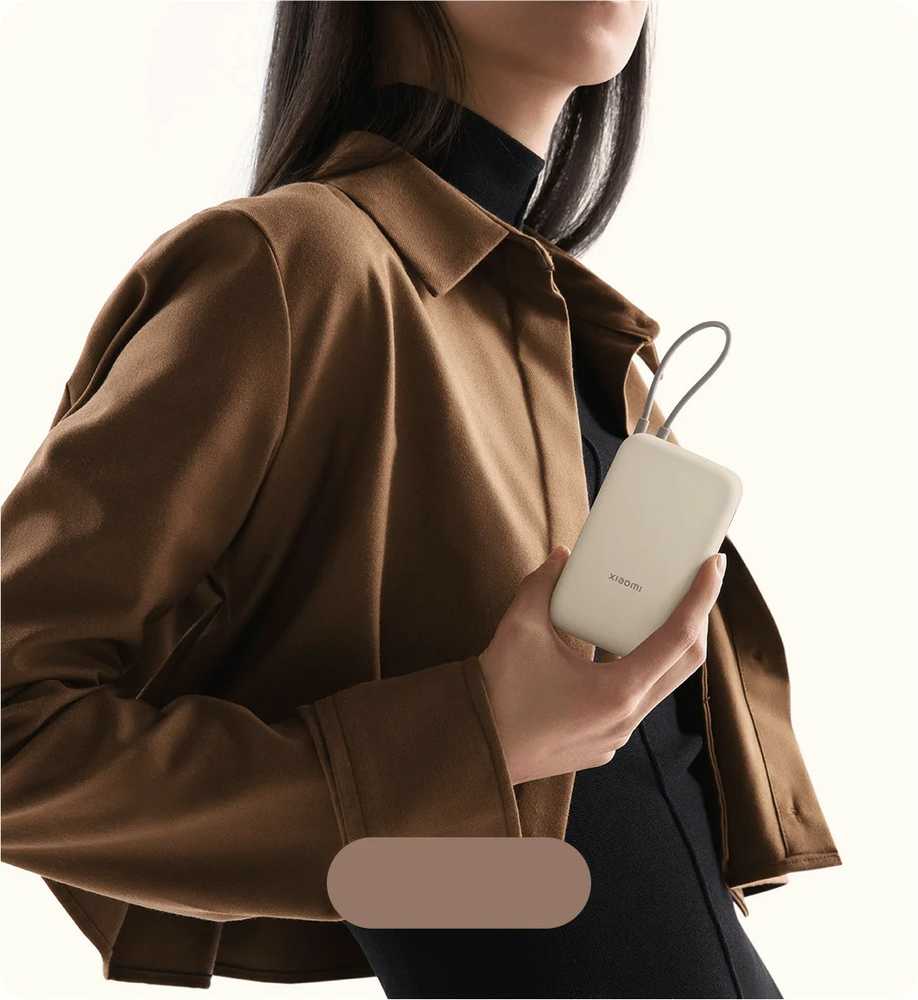 Išorinė baterija Xiaomi Power Bank 10000mAh (su integruotu kabeliu), kreminės spalvos