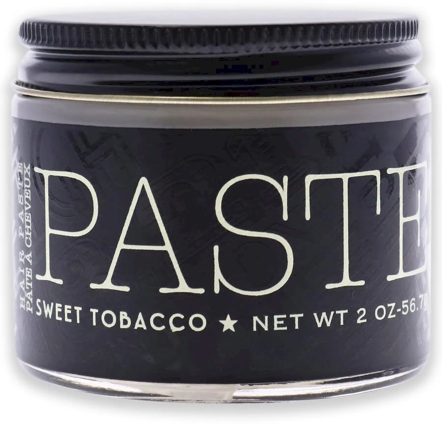 18.21 Man Made Paste Sweet Tobacco plaukų formavimo pasta, 56,7 g