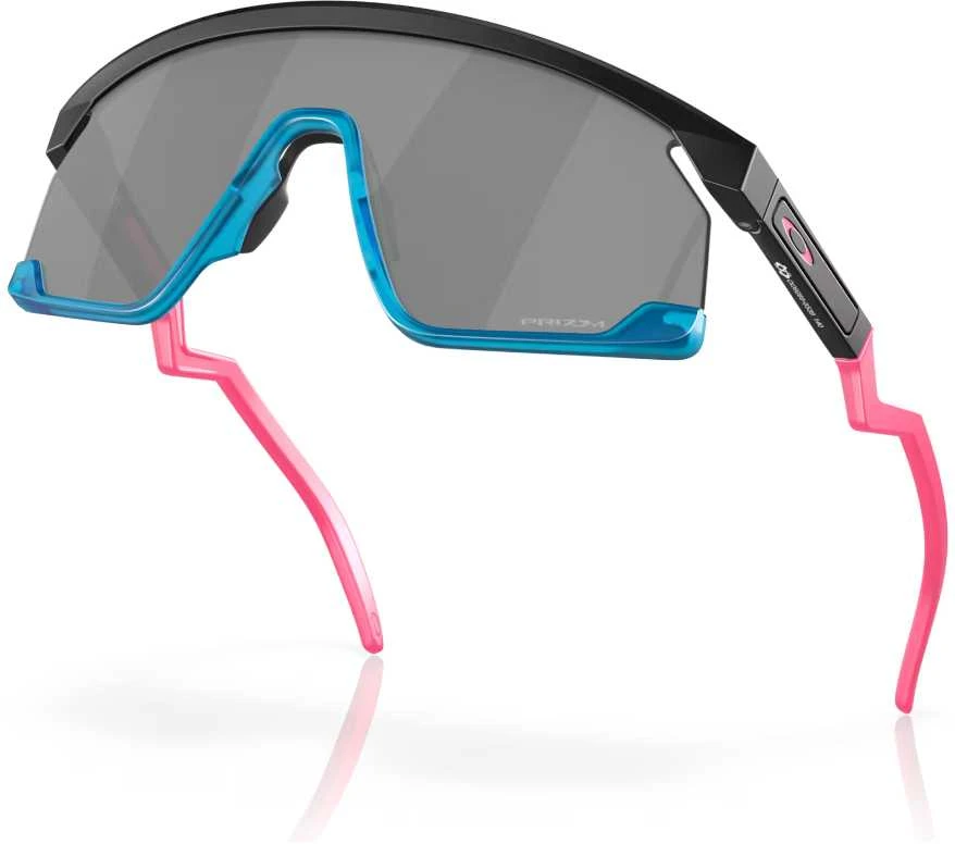 Oakley BXTR akiniai su rožinėmis kojelėmis ir mėlynais rėmeliais