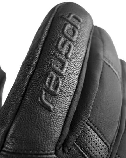 Reusch Jupiter pirštinės – stambus plano logotipo fragmentas