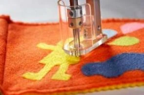 Siuvimo mašina Merrylock SP1000 vėlimo mašina