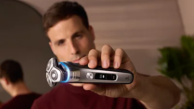 Philips i9000 Prestige drėgnojo ir sausojo skutimo skustuvas su „SkinIQ“ aprašymas - Prekės nuotrauka