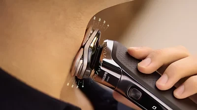 Philips i9000 drėgno ir sauso skutimo elektrinis skustuvas su „SkinIQ“ | X9002/10 aprašymas - Prekės nuotrauka
