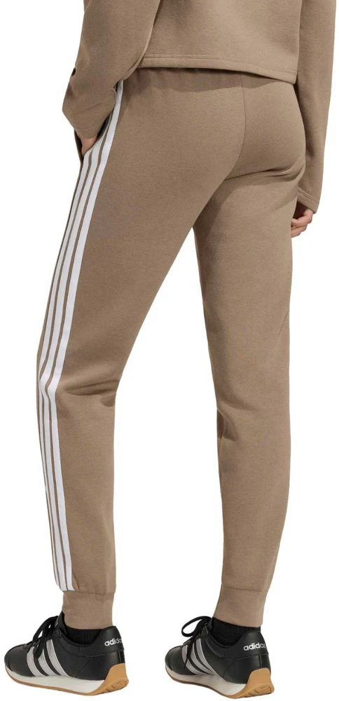 Kelnės moterims adidas Essentials 3-Stripes Fleece Slim smėlio sp. KF8317 (L)