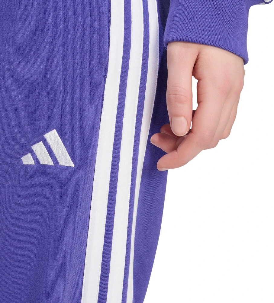 Kelnės moterims adidas Essentials 3-Stripes French Terry Cuffed violetinė KF8340 (XL)