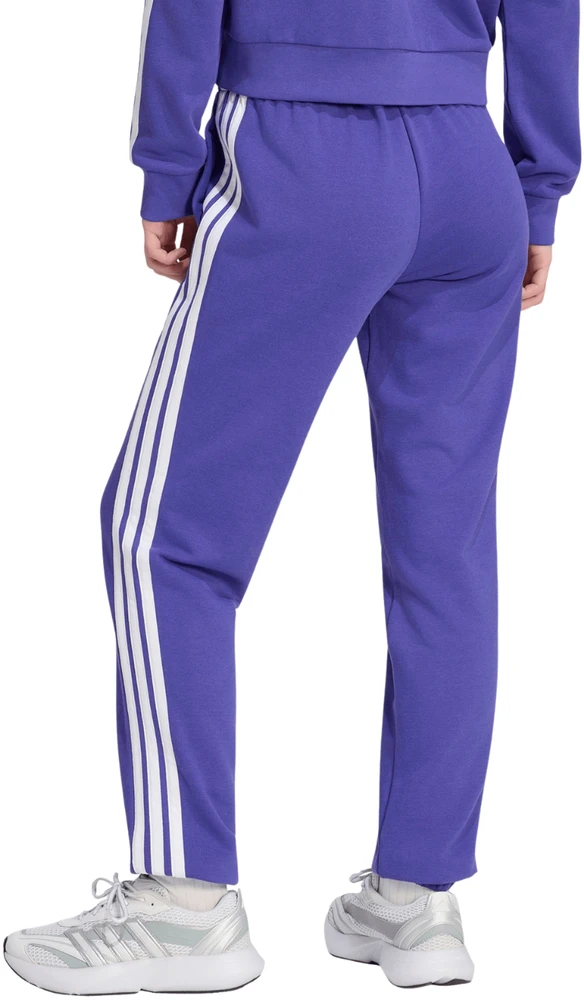 Kelnės moterims adidas Essentials 3-Stripes French Terry Cuffed violetinė KF8340 (XL)