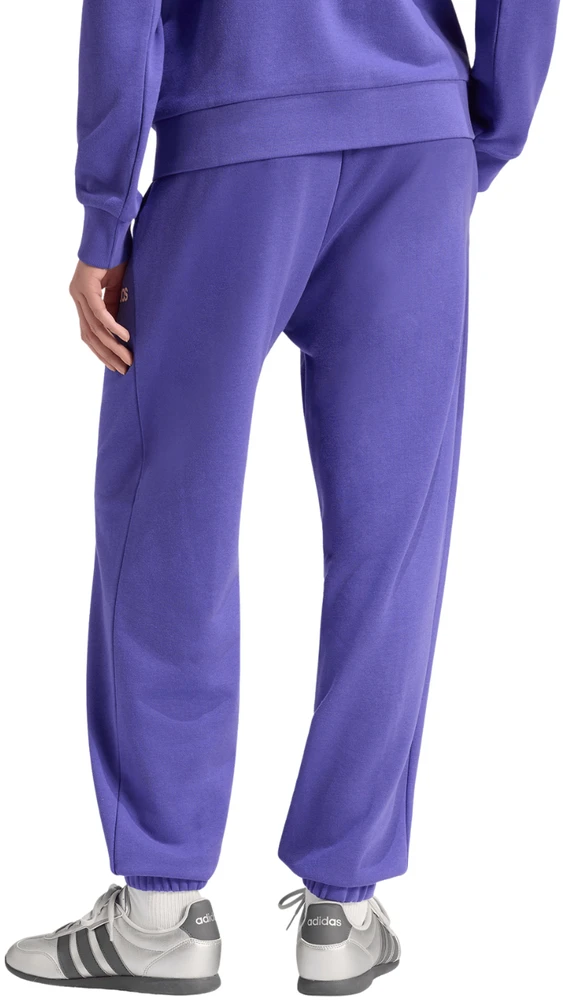 Kelnės moterims adidas Essentials Linear French Terry Cuffed violetinė KF8363 (L)
