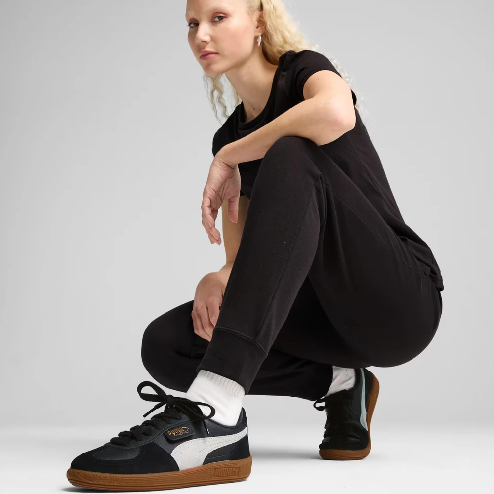 Kelnės moterims Puma ESS Sweatpants TR juoda 683284 01 (L)