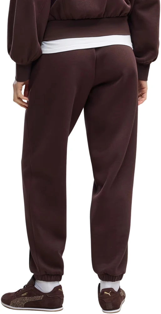 Kelnės moterims Puma Her Comfort Pants Fl ciemnobrązowe 694032 33 (L)
