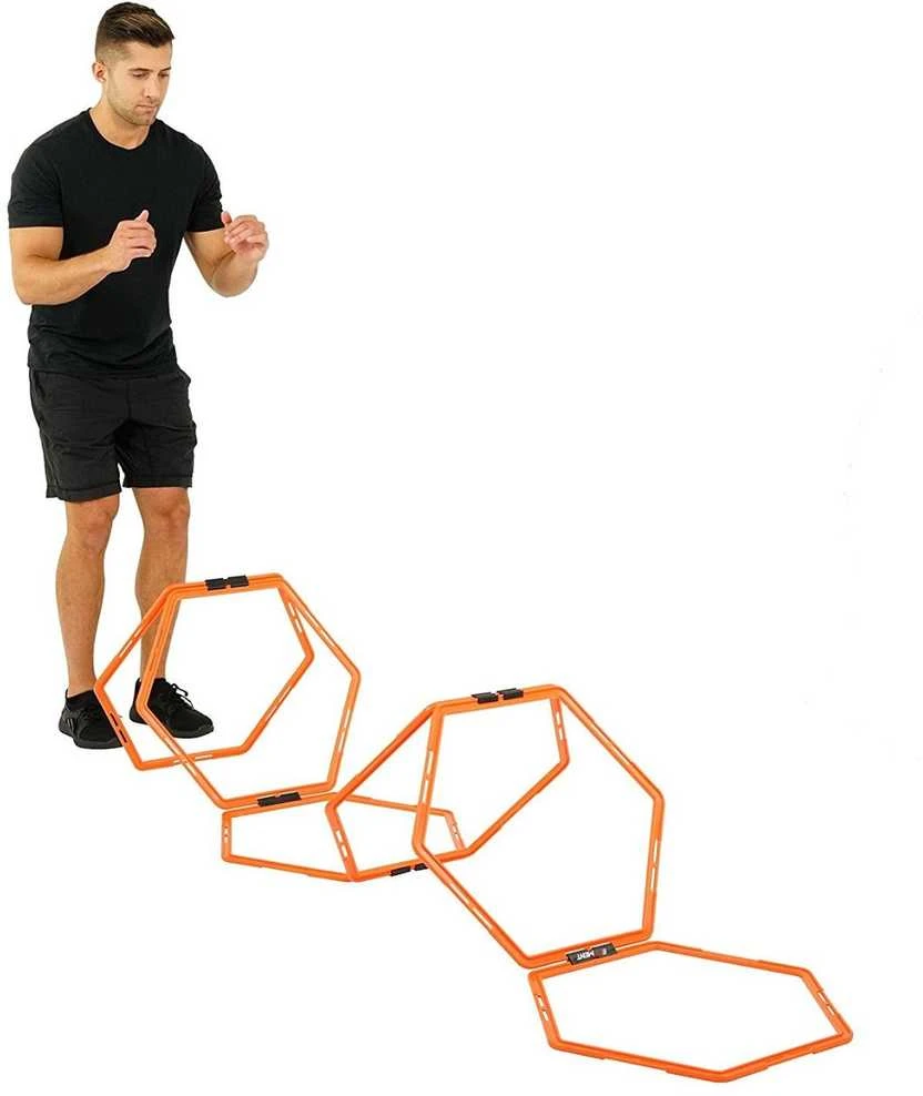 Hexa hoops koordinaciniai ratai su sportuojančiu žmogumi
