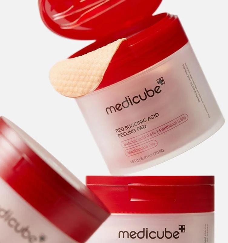 Medicube Red Succinic Acid Peeling Pad Šveičiamieji padeliai probleminei veido odai su gintaro rūgštimi, 70 vnt