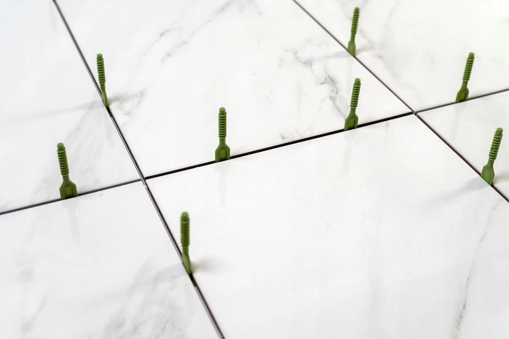 Pozostali Producenci PLYTELIŲ LYGIAVIMO SISTEMOS PAGRINDAS /50vnt. PRO-LEVELING