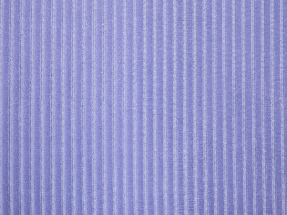 Beliani Sėdimasis pufas NILI veliūrinis šviesiai violetinis