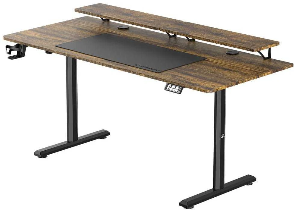 ULTRADESK HIGHLANDER XXL BROWN Biurko su elektryczną regulacją aukščio su laikikliu ausinės i kable 160X70 cm, ruda