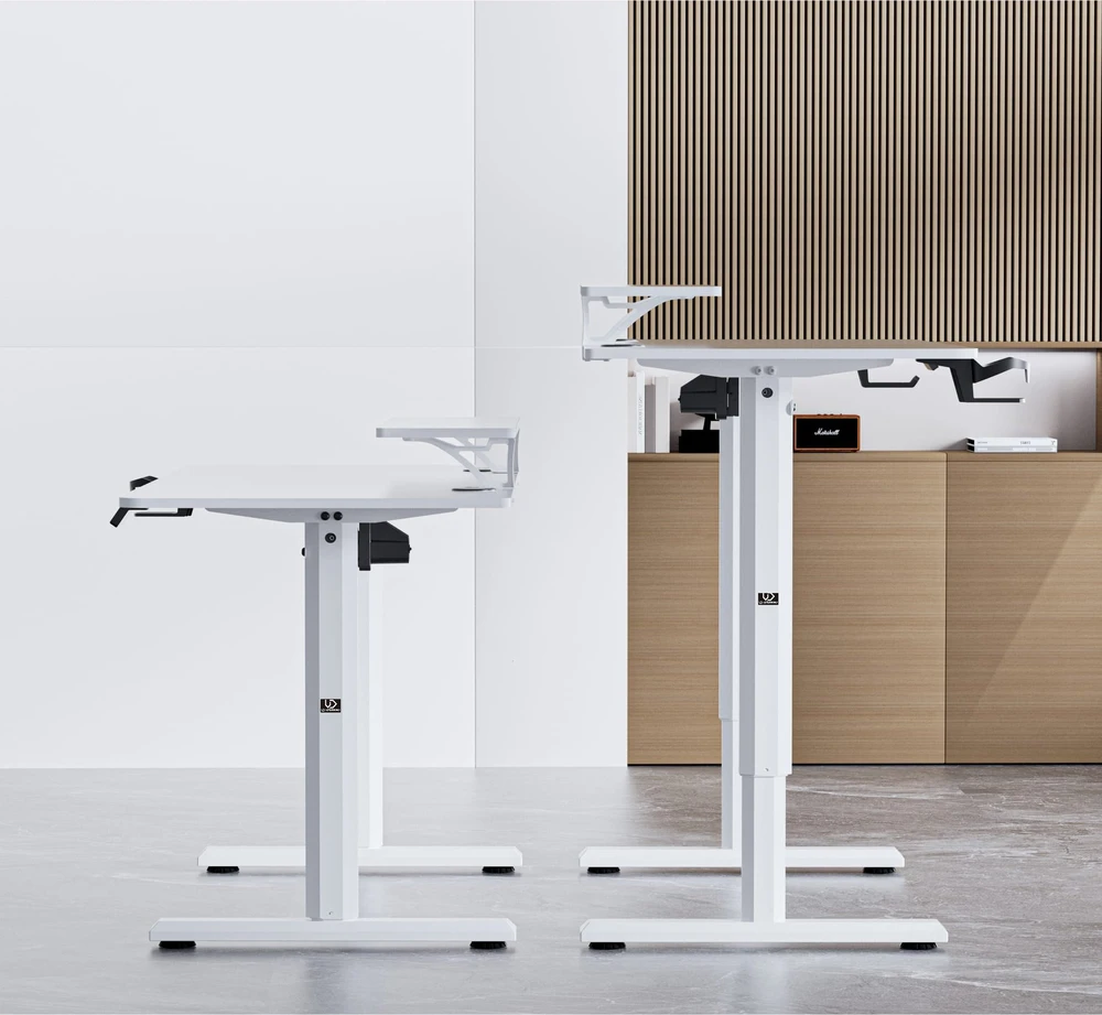 ULTRADESK HIGHLANDER Baltas Biurko su elektryczną regulacją aukščio su laikikliu ausinės i kable 120X60 cm, balta