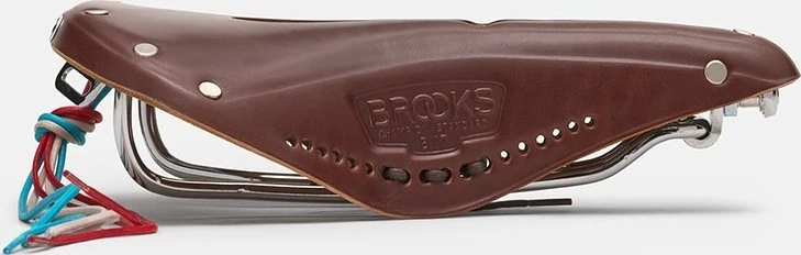 Brooks Balnelis BROOKS B17 CARVED, rudos spalvos, plieniniai lankeliai, svoris 520 g, linija Leather
