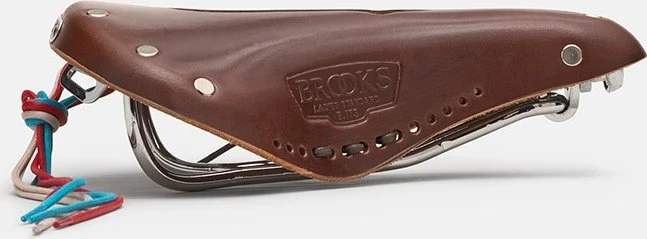 Brooks BROOKS B17 CARVED SHORT balnelis, rudas, plieniniai lankeliai, svoris 460 g, linija „Leather"