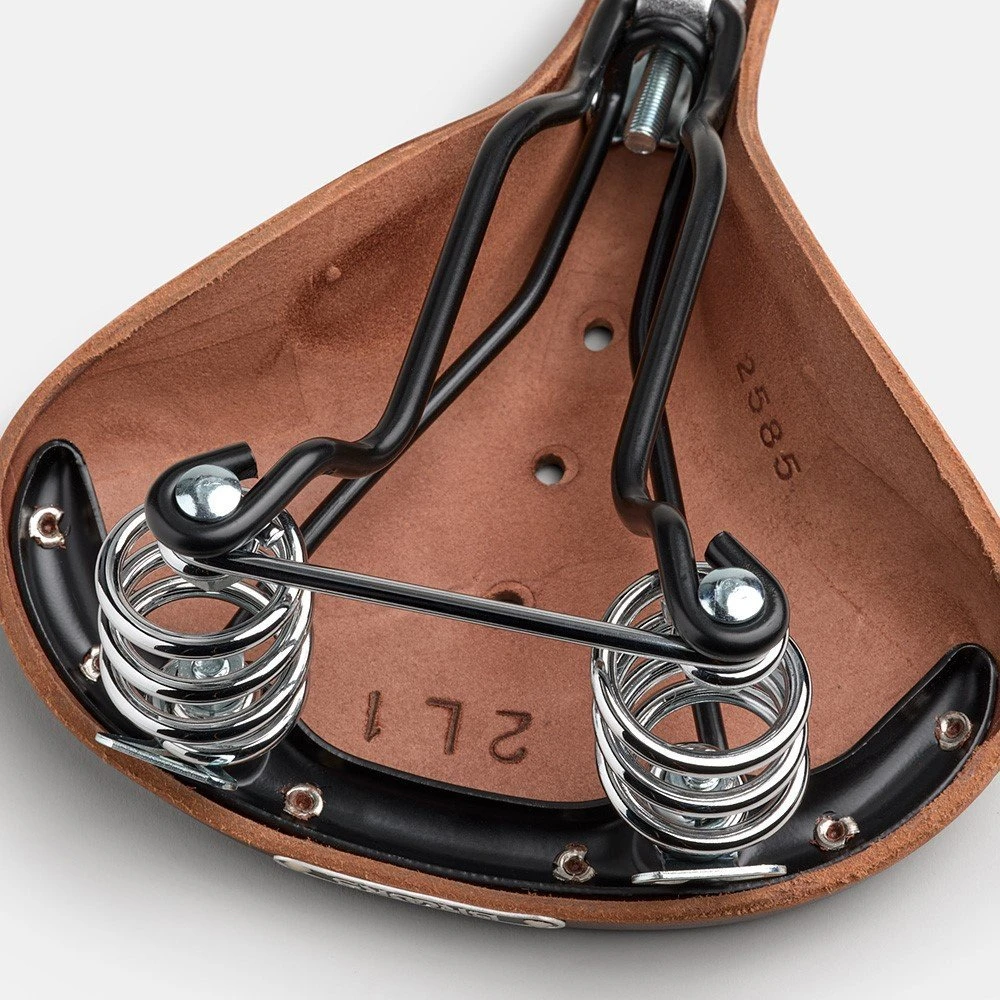 Brooks BROOKS B67 SHORT balnelis, ruda spalva, plieniniai lankai, svoris 810 g, linija Leather (NAUJAS)