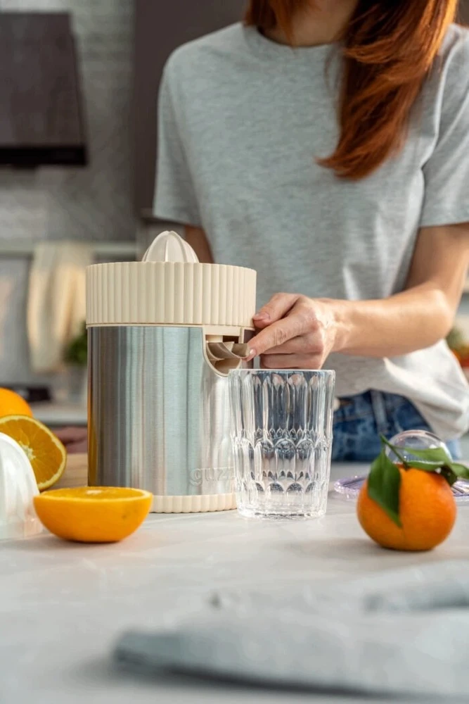 Citrusinių vaisių sulčiaspaudė Guzzini Sous Chef wyciskarka do cytrusów krem
