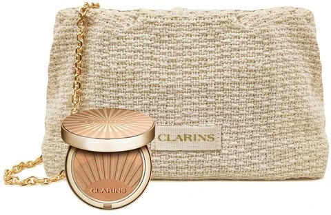 CLARINS RINKINYS (POUDRE SOLEIL 25 + VASARINIS PAKUOTĖLIS)