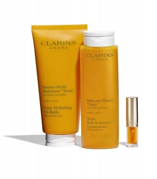 „Clarins“ rinkinys „Clarins“: kvapiųjų, eterinių aliejų, drėkinamasis, kūno aliejus, 200 ml + kvapiųjų, eterinių aliejų, dušo želė, visam kūnui, 200 ml + lūpų kondicionierius, lūpų aliejus, 01, 1,4 ml *Miniatiūrinis + „Clarins“, užsegamas užtrauktuku, GWP tekstilinis maišelis, baltas unisex