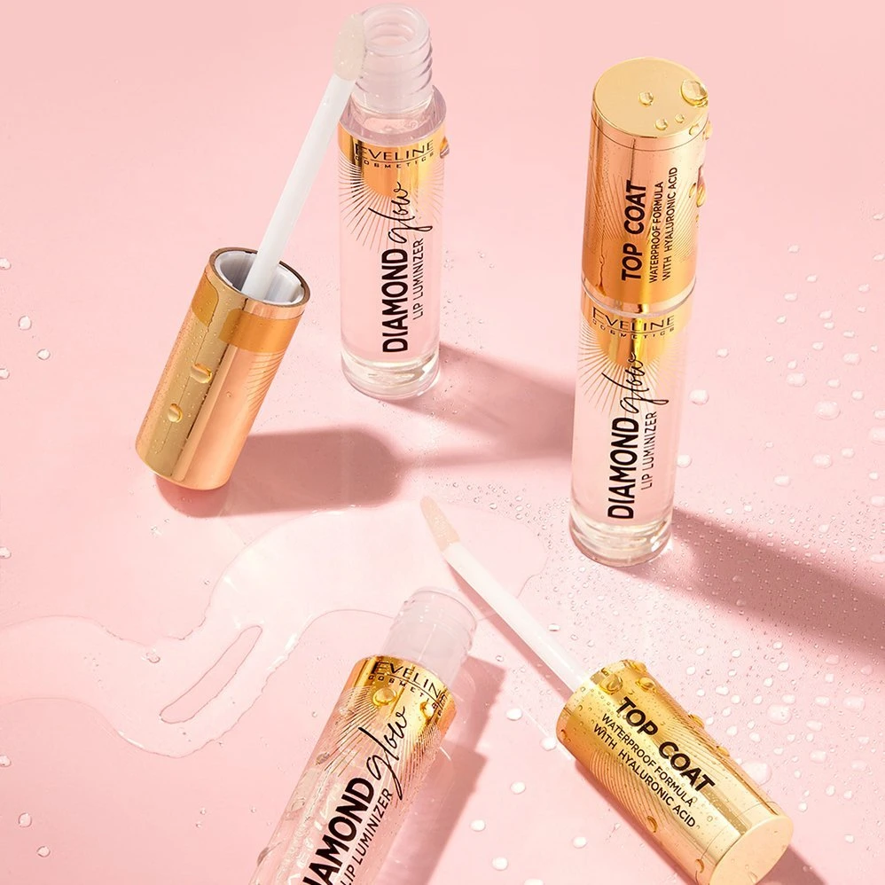 Eveline Cosmetics Diamond Glow Lip Luminizer viršutinis sluoksnis 12 su auksinėmis dulkėmis, 4,5 ml