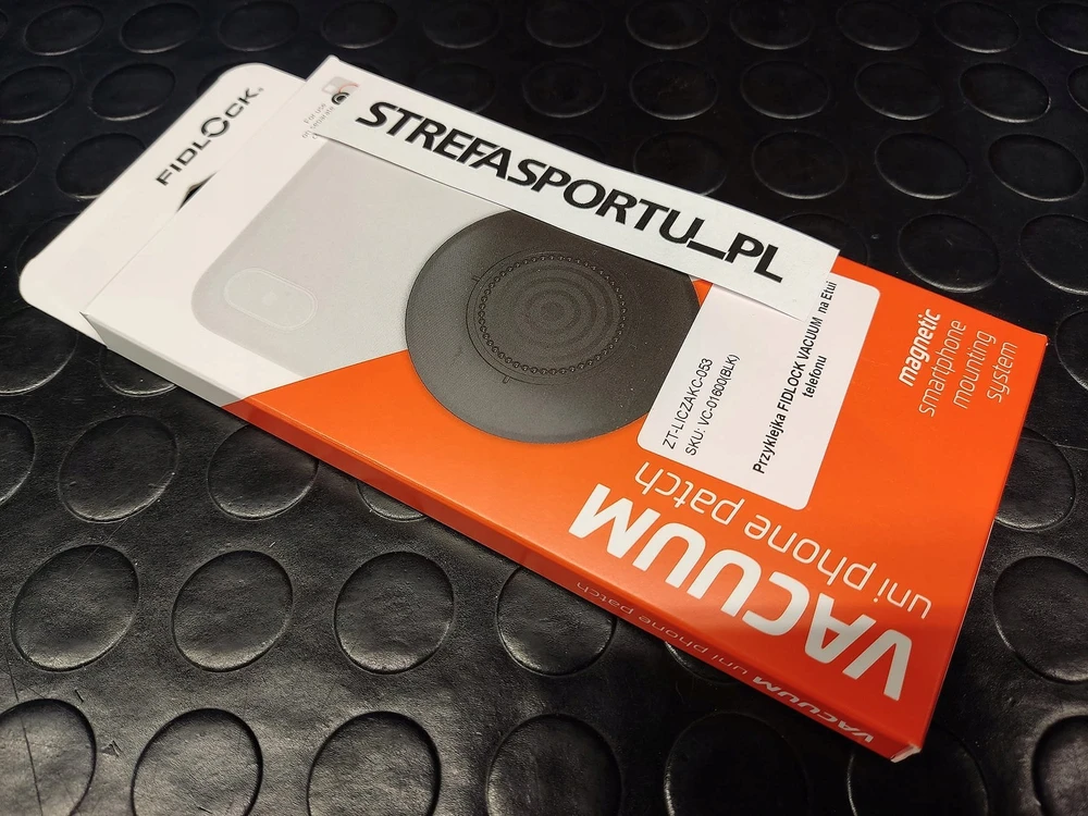 Adapteris telefonui universalus priklijuojamas Fidlock Vacuum uni phone patch
