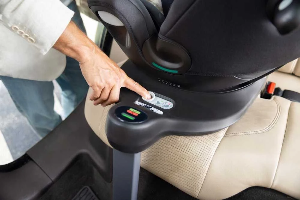 Graco Turn2me Grow pasukimo mechanizmo mygtukas