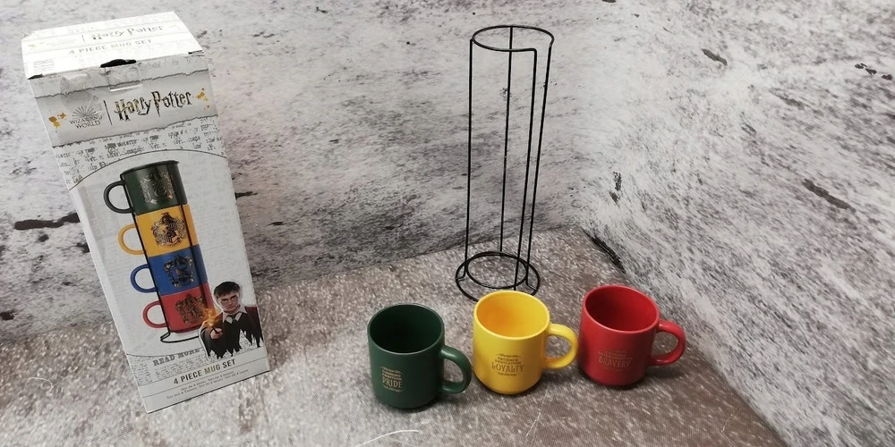 Harry Potter Haris Poteris - Rinkinys keraminiai puodeliai su stovu 300 ml 4 vnt. Hogvartso namai