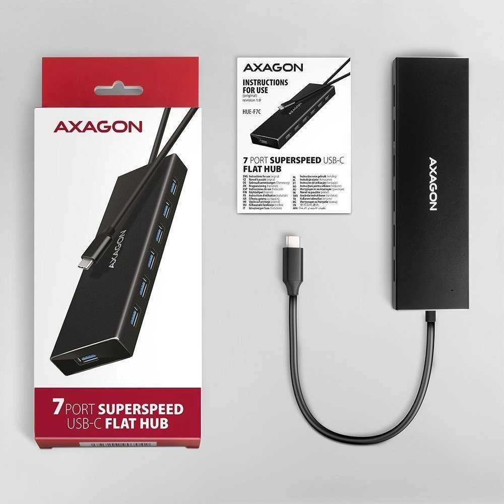 „Axagon“ septynių prievadų USB 3.2 Gen 1 šakotuvas su įkrovimo palaikymu. Jungtis išoriniam maitinimo šaltiniui. USB-C laidas 30 cm.