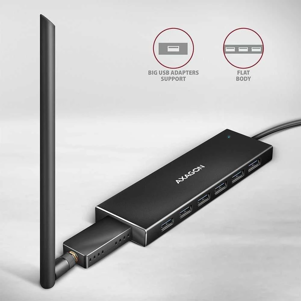 „Axagon“ septynių prievadų USB 3.2 Gen 1 šakotuvas su įkrovimo palaikymu. Jungtis išoriniam maitinimo šaltiniui. USB-C laidas 30 cm.
