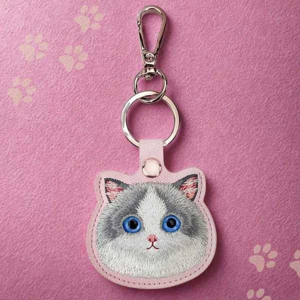 Dėklas Locator Nimmy Big Eyed Pet 2.0 Cat rožinės spalvos