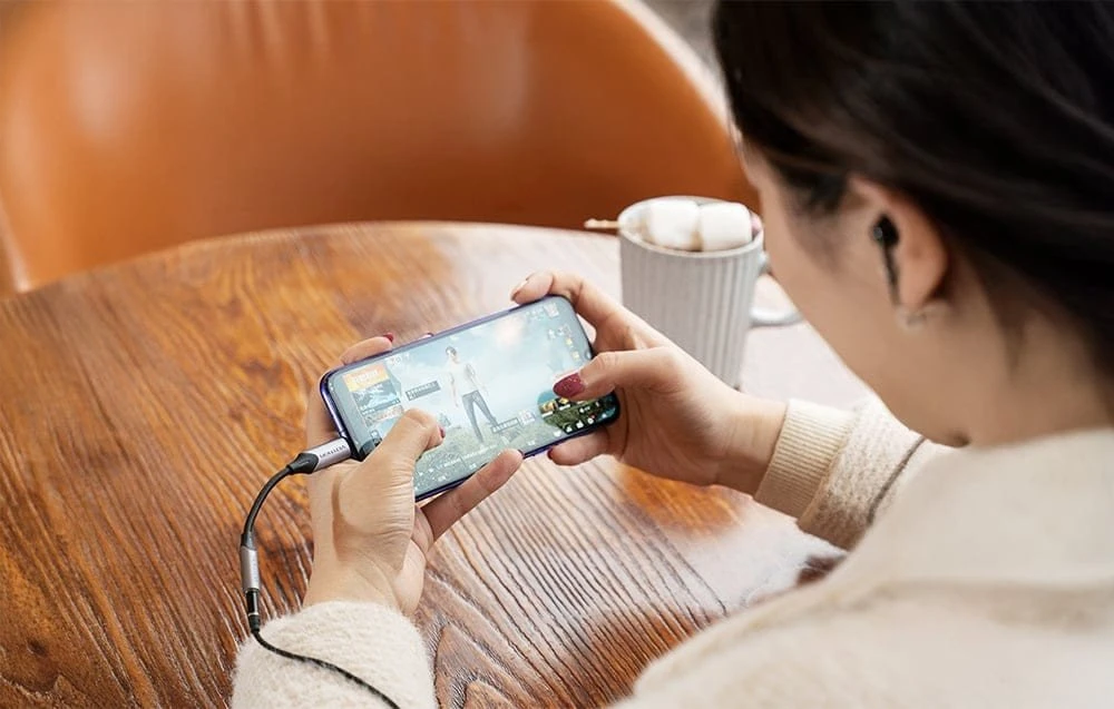 Vention USB-C į 3.5mm adapteris naudojant telefoną