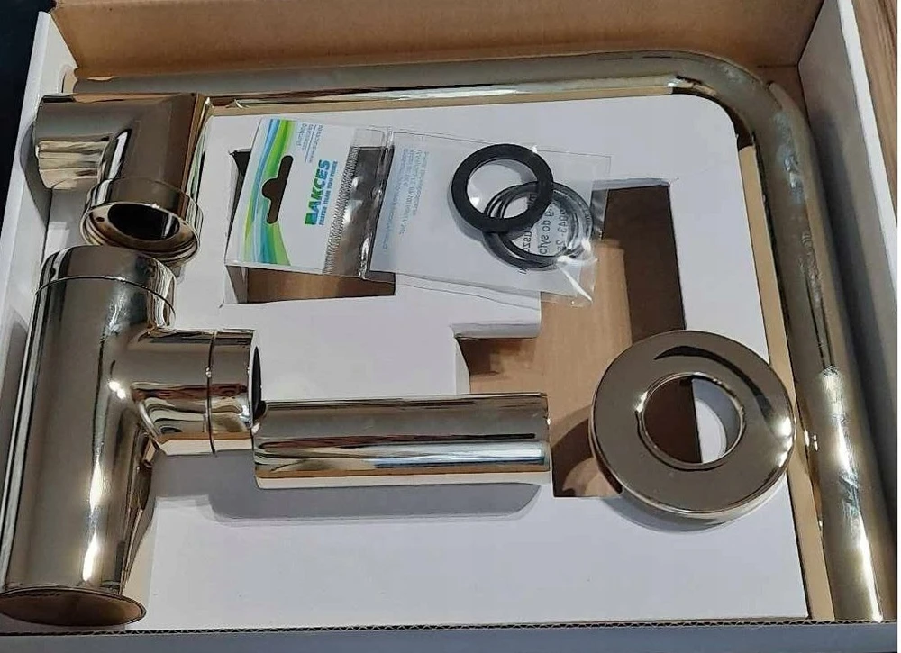 [[KEEP0]] Sifonas Alca plast 22944 / AKCESS / AXUS LUX – taupantis vietą, šviesaus aukso spalvos, apvali kolba, tiesi išleidimo anga 32, dekoratyvinė dėžutė