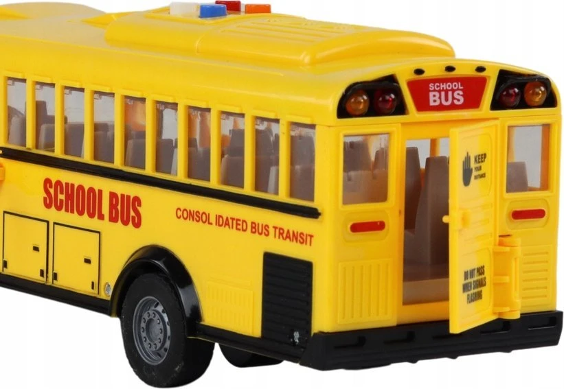 Mokyklinis autobusas su garsais ir šviesom, geltonas